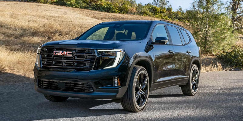 2026 GMC Acadia front view on road
